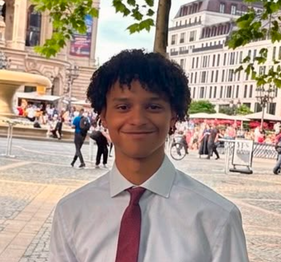 {{ t.portraitAlt }}